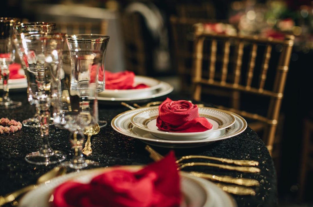 dinner table with black sequin tablecloths