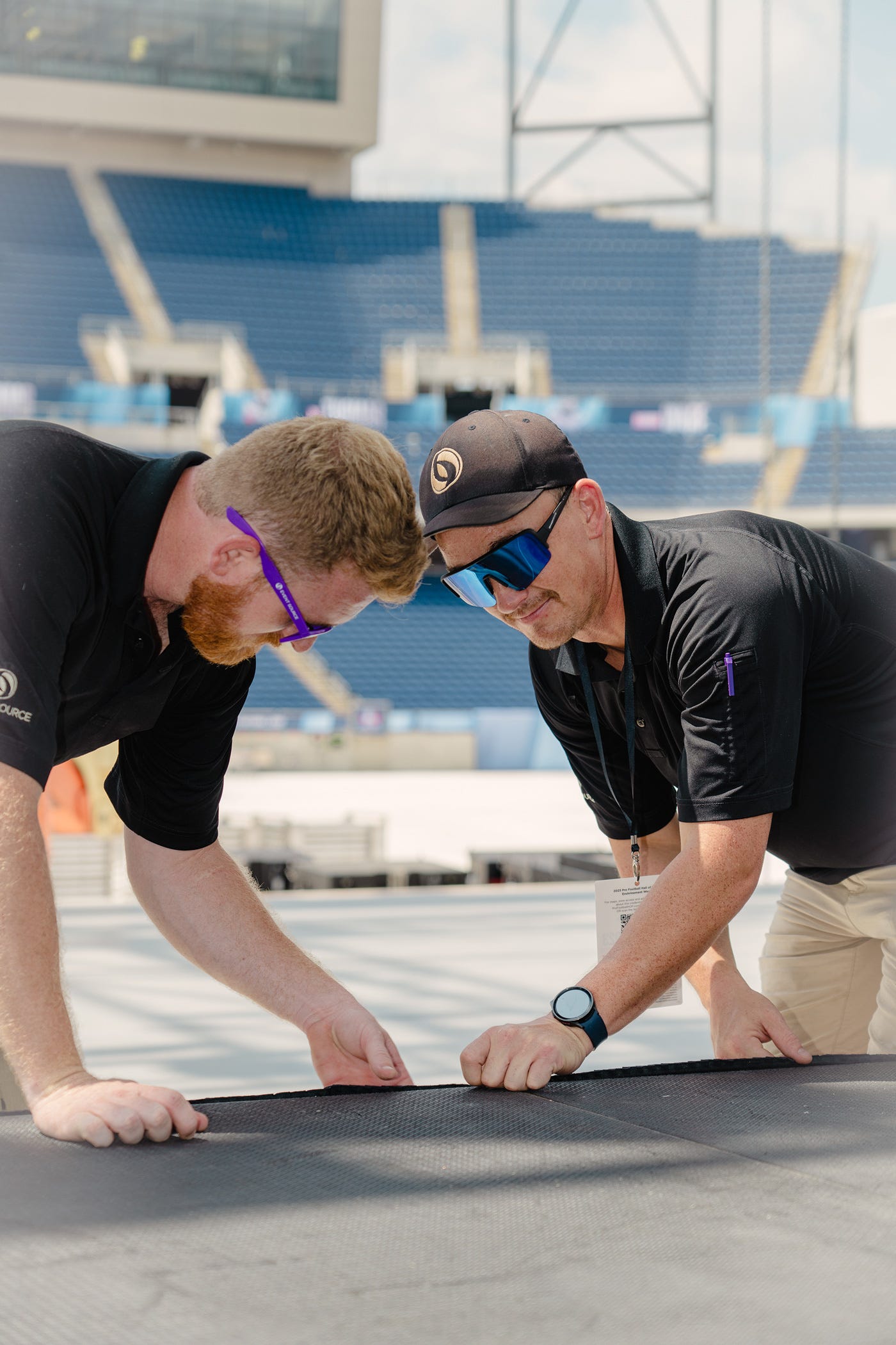Event Source delivery representatives setting up an event in a football stadium